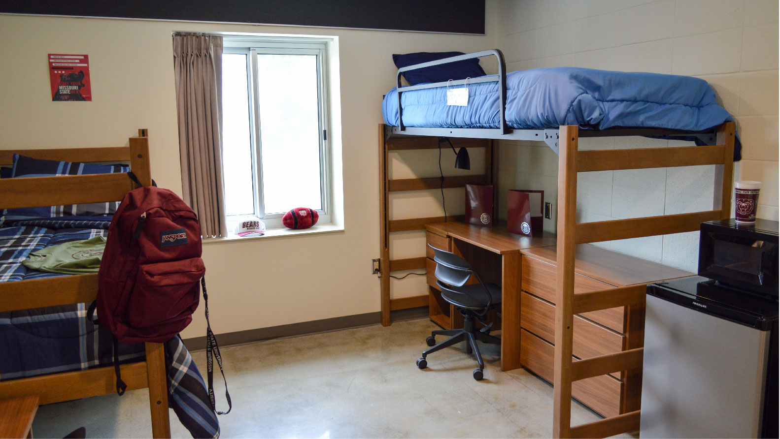 Woods Bedroom with 2 lofted beds desk and chair 3 drawer chest under bed mini fridge microwave