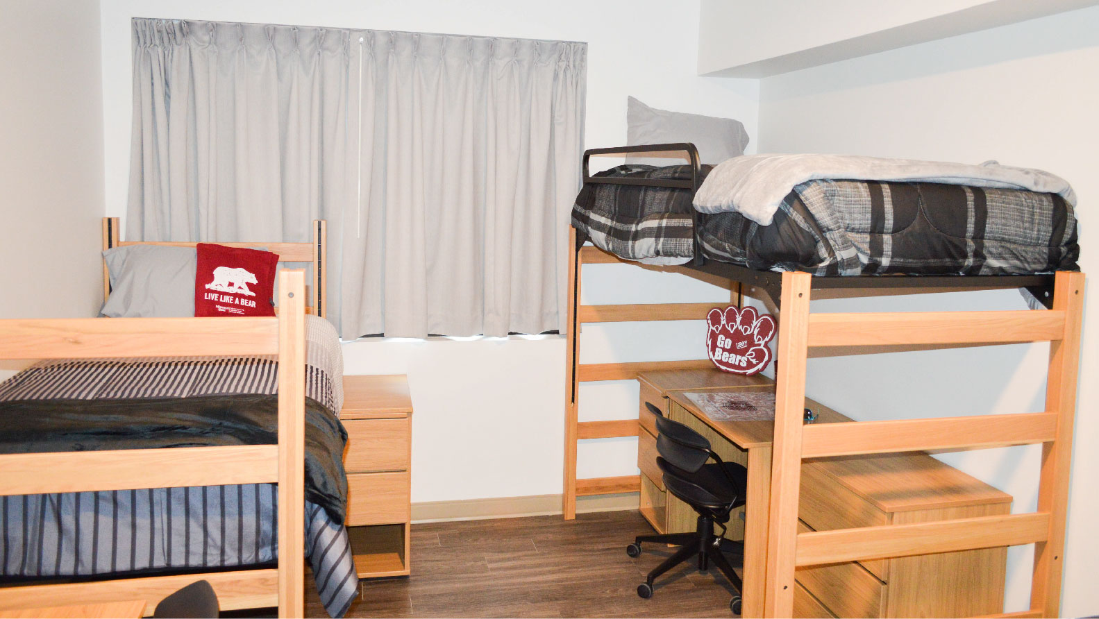 Heitz bedroom with 2 beds one lofted with desk and chair underneath