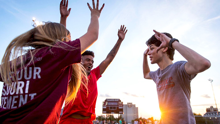 Students excited and jumping