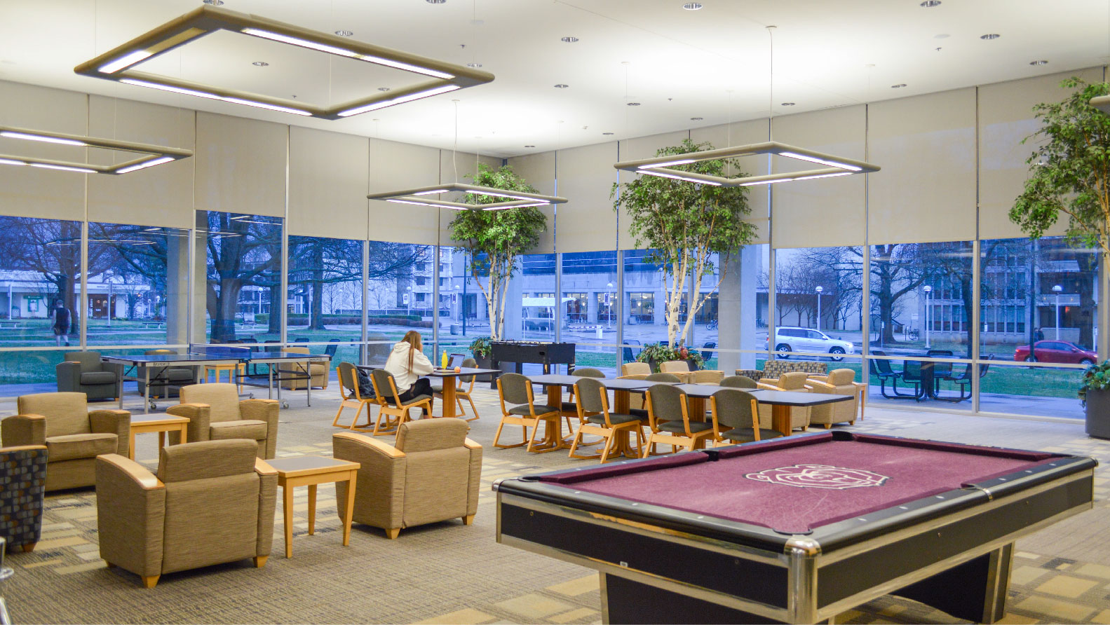 lounge with large windows and lots of seating