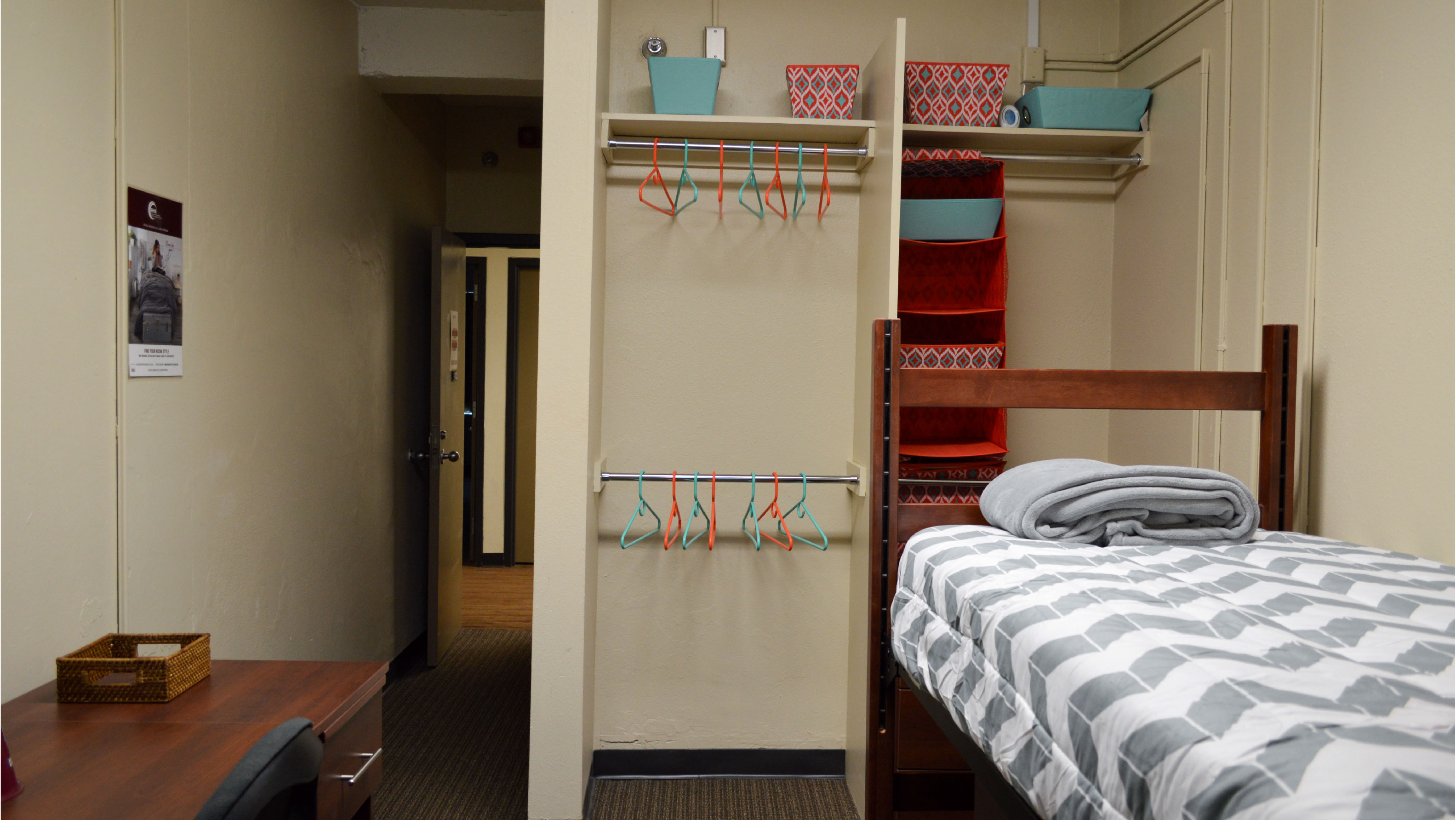 Room with closet and desk