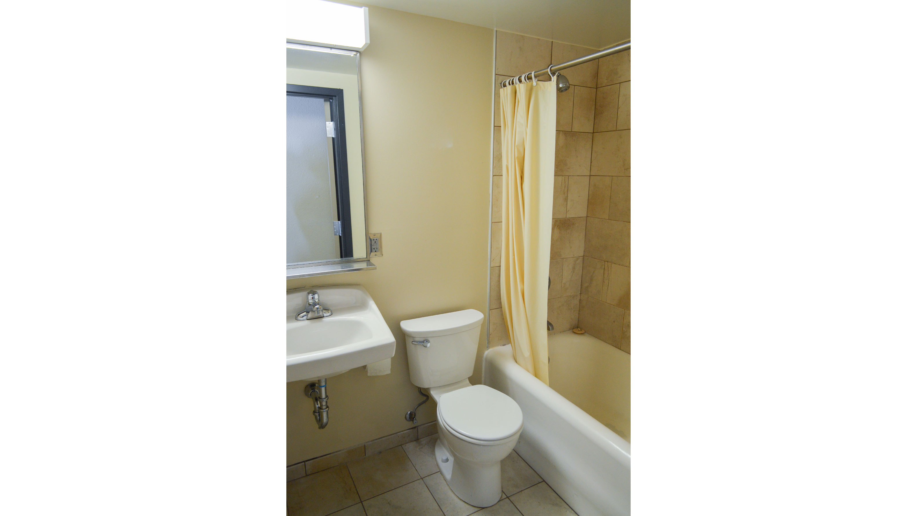 Bathroom with toilet sink and shower