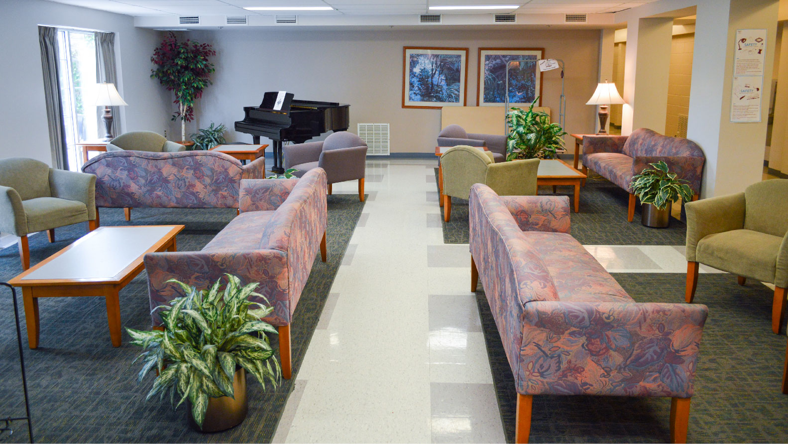 room with couches and coffee tables