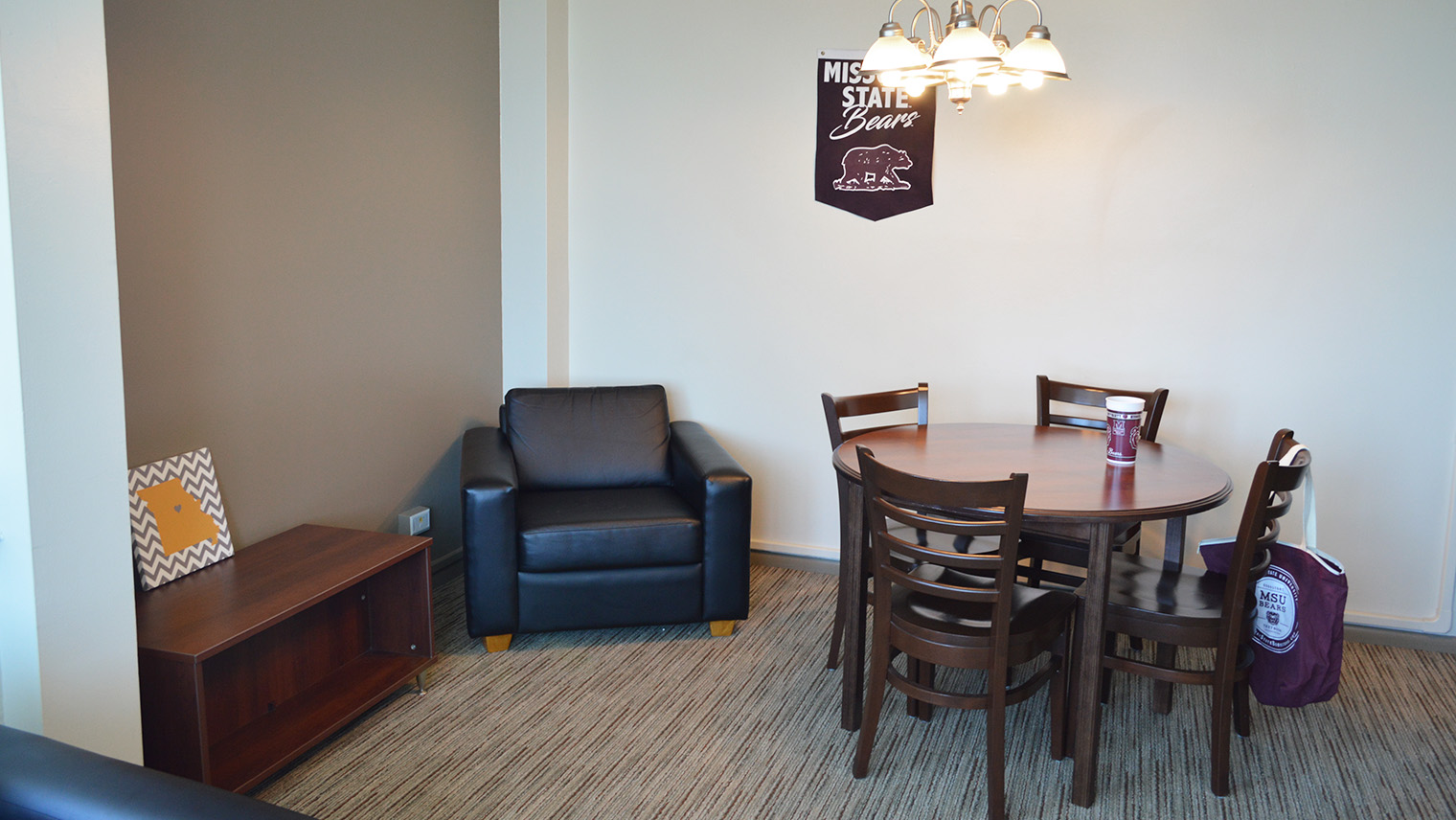 dining area with table and 4 chairs loveseat and in table