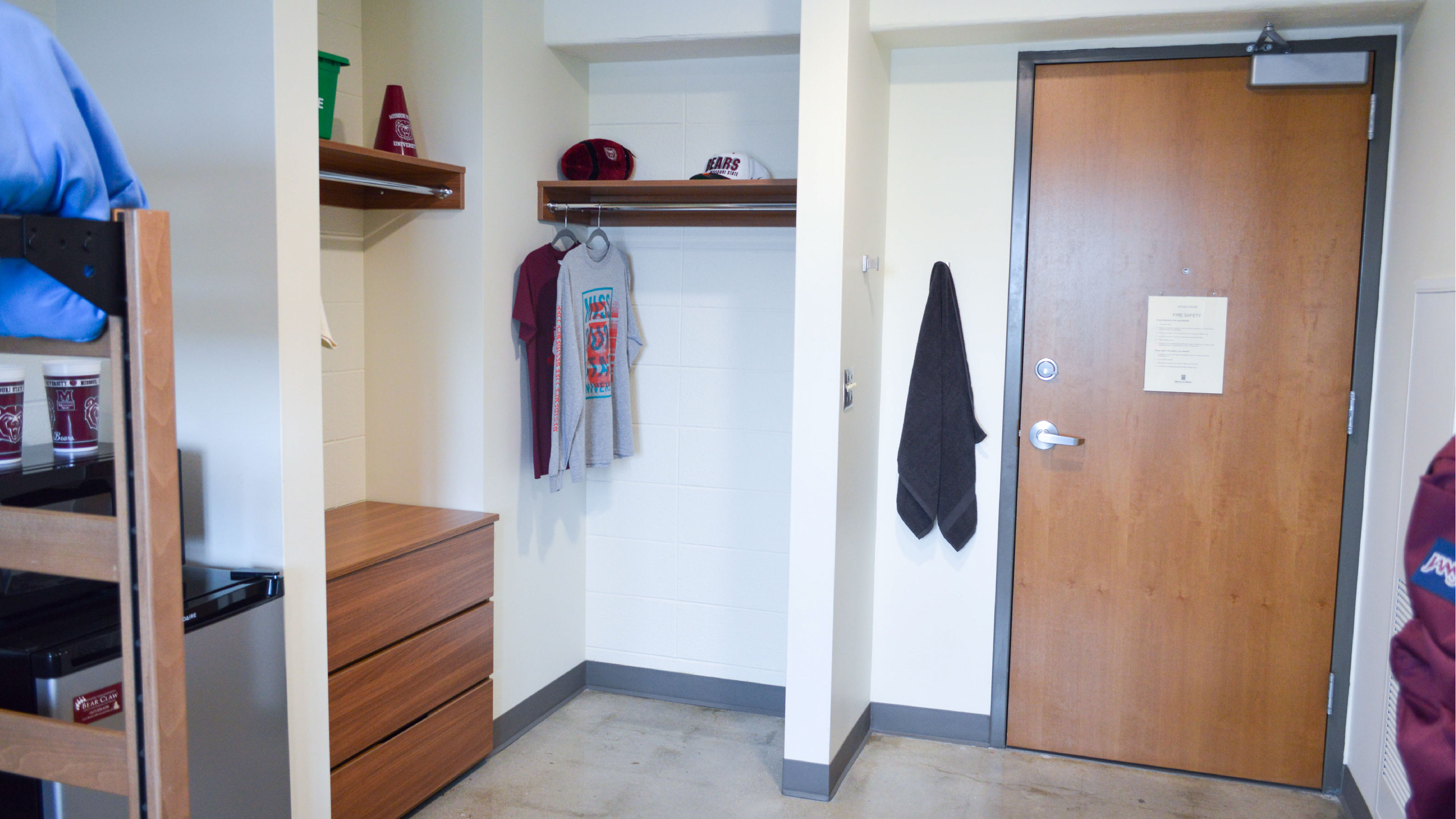 Woods bedroom open closet area with 3 drawer cabinet